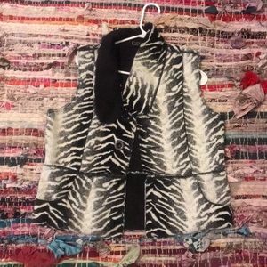 Plush & spunky zebra print vest.